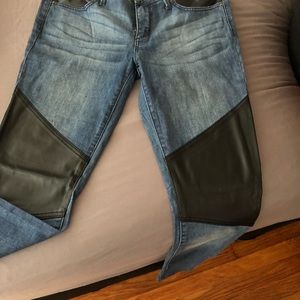 Bebe denim with vegan leather accents